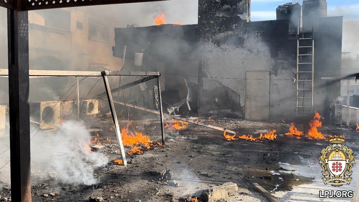 Burning debris in a Gaza monastery campus