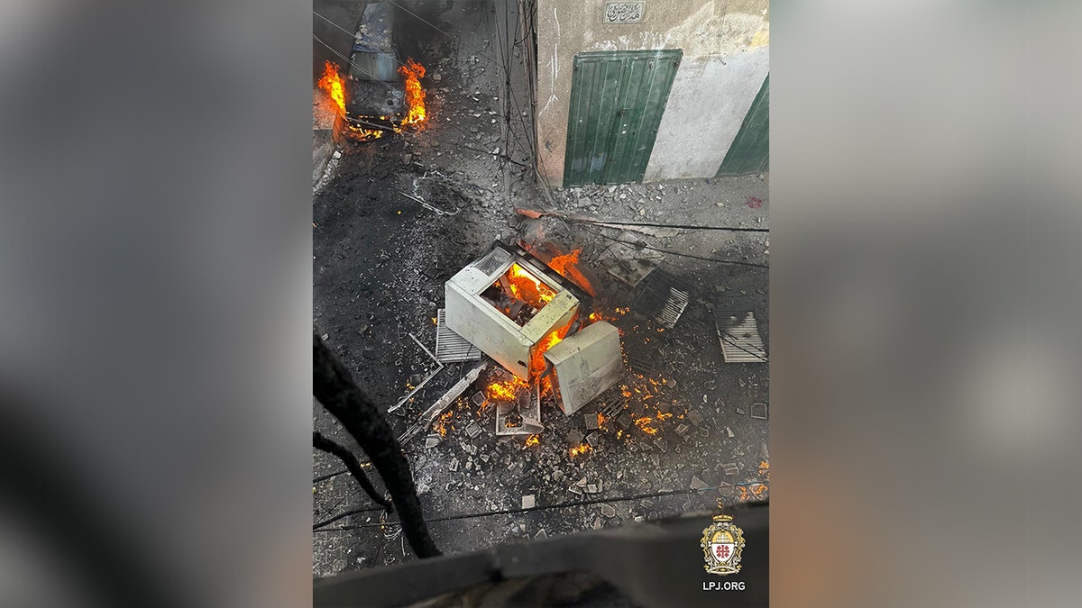 Burning debris in a Gaza monastery campus