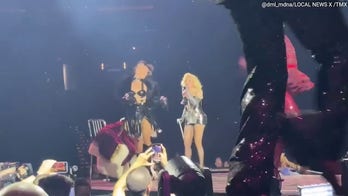 Santa Claus takes a fall during Madonna concert