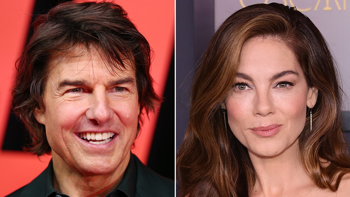 Tom Cruise in a black shirt smiles and looks to his left slightly split Michelle Monaghan soft smiles on the carpet