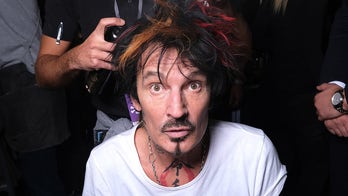 Tommy Lee accused of sexual assault during 2003 helicopter ride