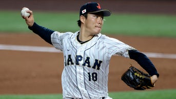 Prized Japanese pitcher reportedly heading out West after  record-breaking deal